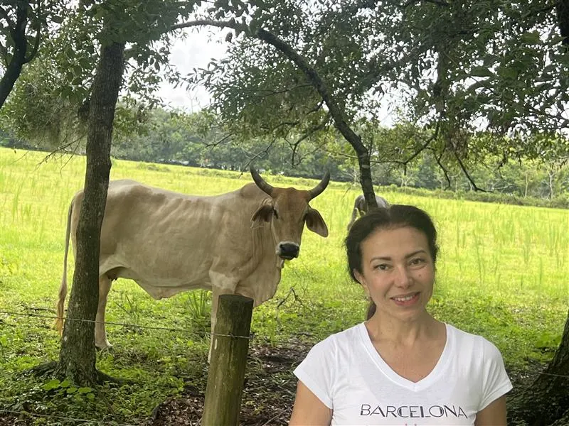 Sanctuary founder with a rescued cow